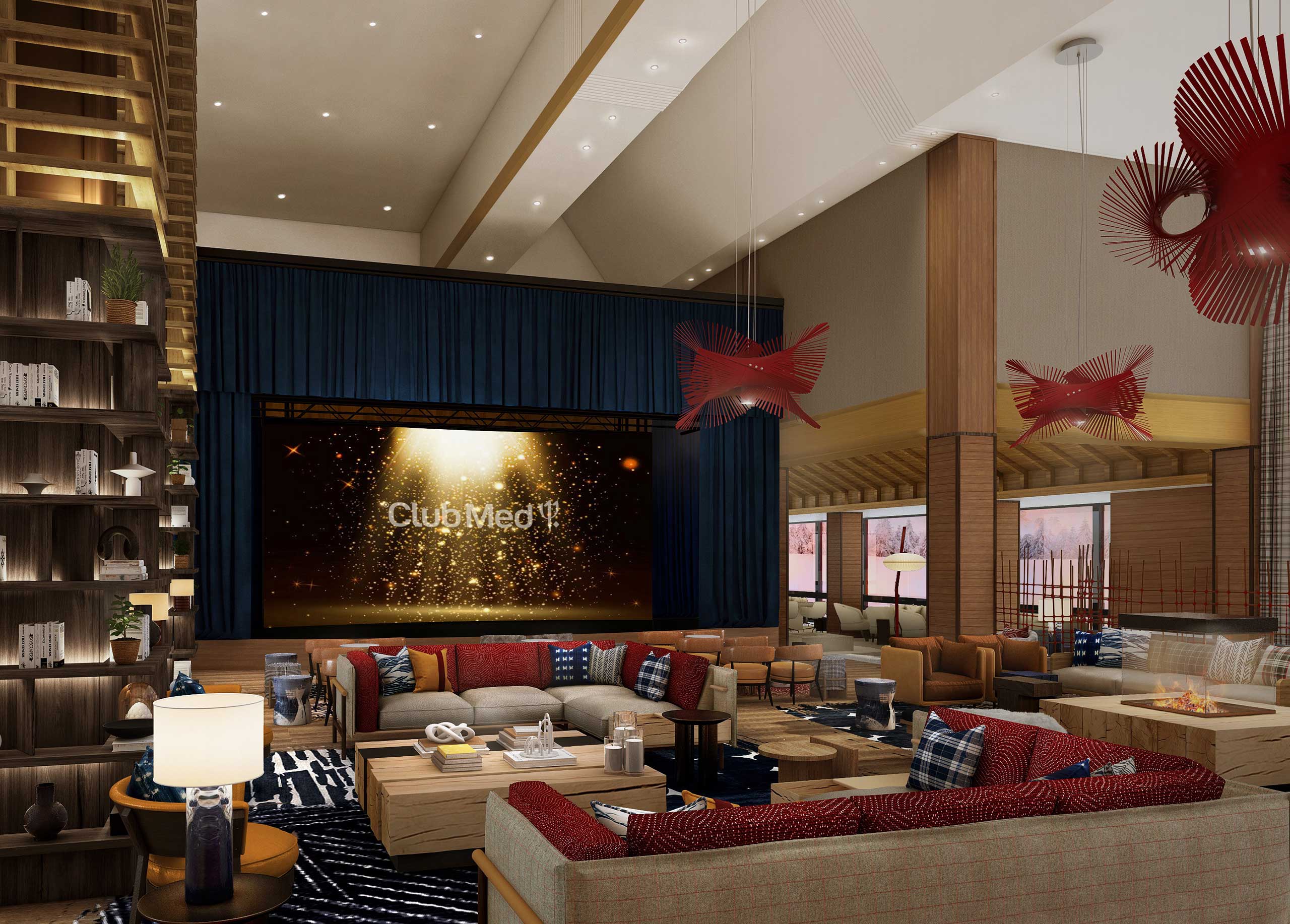 Luxurious resort lobby with modern decor. Features red chairs, blue-and-white cushions, large TV displaying 